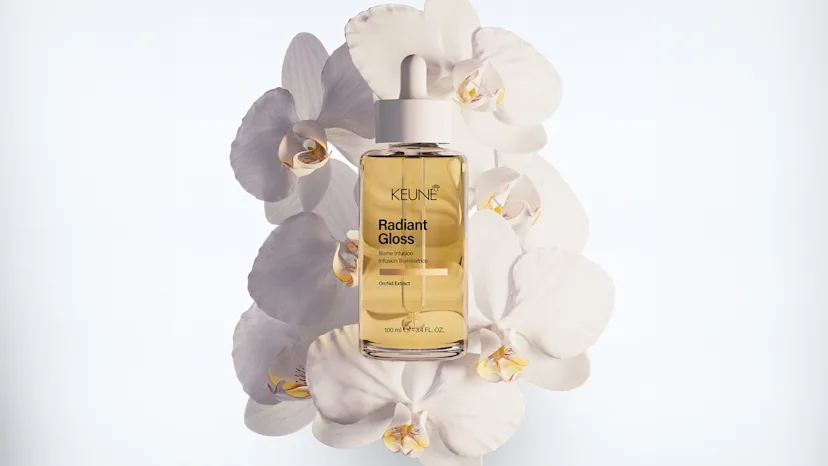 mooie visuals van een haarproduct met bloemen op de achtergrond