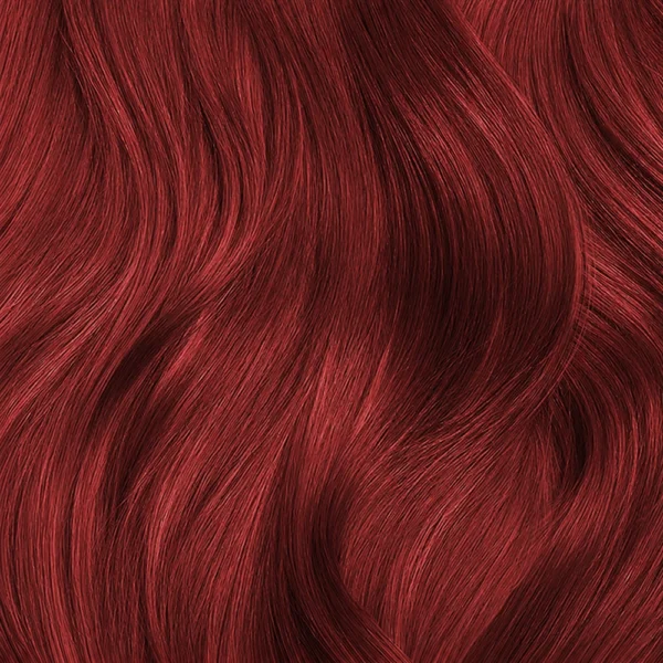 haarlok met een opvallende lichtblonde haarkleur met een krachtige, warme rode uitstraling.